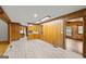 Open dining area with wood paneling at 200 Old Stagecoach Dr, Stockbridge, GA 30281