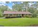Brick ranch home on a grassy lot at 200 Old Stagecoach Dr, Stockbridge, GA 30281