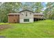 Brick house with deck and large backyard at 200 Old Stagecoach Dr, Stockbridge, GA 30281