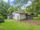 Detached outbuilding with garage door at 200 Old Stagecoach Dr, Stockbridge, GA 30281