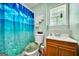 Bathroom with shower/tub, vanity, and window at 90 Bentgrass Ct, Dallas, GA 30157