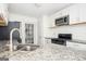 Modern kitchen with granite countertops and stainless steel sink at 308 Royal Crescent Way, Stockbridge, GA 30281