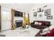 Spacious living room with fireplace and leather sofas at 308 Royal Crescent Way, Stockbridge, GA 30281