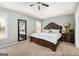 Spacious main bedroom with high ceilings and ceiling fan at 308 Royal Crescent Way, Stockbridge, GA 30281