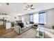 Living room with sectional sofa and kitchen island view at 60 Ascott Trce, Covington, GA 30016