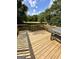 Wooden deck with Blackstone griddle, overlooking the backyard at 470 Harris Rockmore Loop, Covington, GA 30014