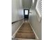 Carpeted stairs leading to the upper level of the home at 470 Harris Rockmore Loop, Covington, GA 30014