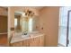 Bright bathroom featuring modern fixtures, natural light, and a large mirror at 5738 Antelope Trl, Atlanta, GA 30349