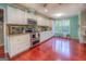 Spacious kitchen featuring granite countertops and ample cabinetry at 2037 Emily Dr, Social Circle, GA 30025