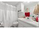 Clean bathroom with shower/tub combo and white vanity at 1152 Strath Clyde Way, Mcdonough, GA 30253