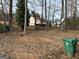 Wooded backyard with a large, flat area at 5303 Kemper Pl, Stone Mountain, GA 30088