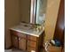 A bathroom vanity with a sink and drawers needing updating at 5303 Kemper Pl, Stone Mountain, GA 30088