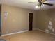 Simple living room with light walls and laminate floors at 5303 Kemper Pl, Stone Mountain, GA 30088