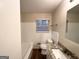 Clean bathroom with granite vanity and updated fixtures at 2304 Springdale Sw Cir, Atlanta, GA 30315