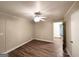 Spacious bedroom with hardwood floors and ceiling fan at 2304 Springdale Sw Cir, Atlanta, GA 30315