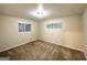 Well-lit bedroom with carpet and neutral color scheme at 2304 Springdale Sw Cir, Atlanta, GA 30315