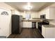 Renovated kitchen with granite countertops and stainless steel appliances at 2304 Springdale Sw Cir, Atlanta, GA 30315