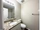 Bathroom with granite vanity and tub shower at 3993 Flakes Mill Rd, Decatur, GA 30034