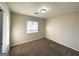 Bright bedroom with neutral walls and carpet at 3993 Flakes Mill Rd, Decatur, GA 30034