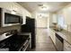 Modern kitchen with stainless steel appliances at 3993 Flakes Mill Rd, Decatur, GA 30034