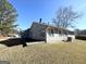 House exterior showcasing a patio and yard at 3205 Cadiz Cir, South Fulton, GA 30349