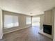 Living room with fireplace and sliding glass doors to patio at 3205 Cadiz Cir, South Fulton, GA 30349