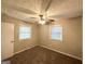 Well-lit bedroom with ceiling fan and neutral wall colors at 3226 Browns Mill Se Rd, Atlanta, GA 30354