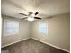 Spacious bedroom with ceiling fan and neutral decor at 3226 Browns Mill Se Rd, Atlanta, GA 30354