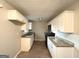 Efficient kitchen with granite countertops and white cabinets at 3226 Browns Mill Se Rd, Atlanta, GA 30354