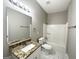 Clean bathroom featuring granite countertop and bathtub at 220 Mountain View Cir, Covington, GA 30016