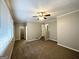 Spacious living room with neutral walls and carpet at 220 Mountain View Cir, Covington, GA 30016
