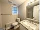 Updated bathroom with granite vanity and walk-in shower at 3951 Wabash Ln, Ellenwood, GA 30294
