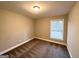 Simple bedroom with neutral walls and carpet flooring at 3951 Wabash Ln, Ellenwood, GA 30294