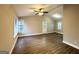 Spacious living room with vaulted ceiling, hardwood floors, and neutral walls at 3951 Wabash Ln, Ellenwood, GA 30294