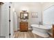 Bathroom with freestanding tub, vessel sink, and wood vanity at 123 Line Creek Way, Sharpsburg, GA 30277