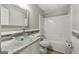 Basement bathroom with glass sink, tile accents, and a tub at 123 Line Creek Way, Sharpsburg, GA 30277