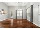 Bright dining room with hardwood floors, chandelier, and access to back deck at 123 Line Creek Way, Sharpsburg, GA 30277