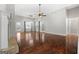 Large living area with hardwood floors and sliding glass doors at 123 Line Creek Way, Sharpsburg, GA 30277