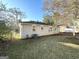 Home's exterior showcasing a large backyard at 2490 Habersham Dr, Decatur, GA 30032