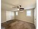 Spacious bedroom with carpet flooring and ceiling fan at 2490 Habersham Dr, Decatur, GA 30032