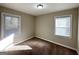 Well-lit bedroom featuring neutral walls and carpet at 2490 Habersham Dr, Decatur, GA 30032