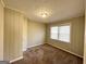 Bright bedroom with neutral walls and carpet at 2490 Habersham Dr, Decatur, GA 30032