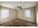 Spacious bedroom with ceiling fan and neutral decor at 2490 Habersham Dr, Decatur, GA 30032