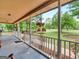 Inviting front porch with a view of the large backyard at 930 Singley Dr, Locust Grove, GA 30248