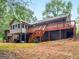 Ranch home with large deck and wooded lot at 930 Singley Dr, Locust Grove, GA 30248