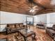 Living room with hardwood floors and view into dining area at 930 Singley Dr, Locust Grove, GA 30248