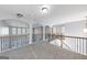 Spacious upper hallway overlooking the main level at 5585 Dendy Trc, Fairburn, GA 30213