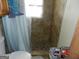 Small bathroom with shower and tile surround at 1434 Butler St, Jonesboro, GA 30236
