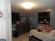 Bedroom with a dresser, bed, and window at 1434 Butler St, Jonesboro, GA 30236