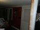 Bedroom with a maroon wall, window, and closet at 1434 Butler St, Jonesboro, GA 30236